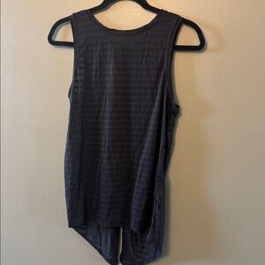 Lululemon black sheer top. P2P 16 1/2”. Length 24” - 26 1/2”. Tie/open back